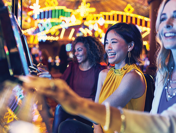 Woman playing slots image